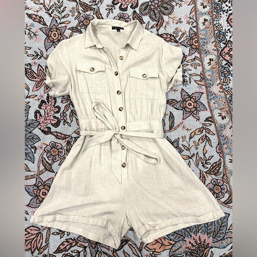 Beige romper, never worn.